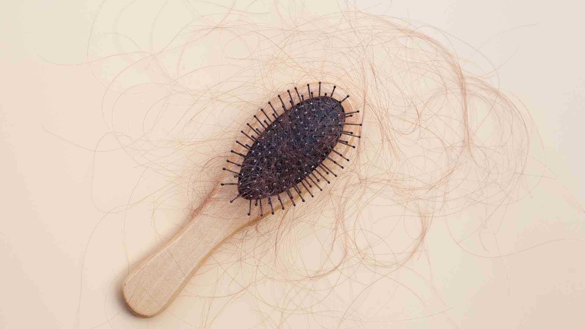 What lesser-known factors can contribute to hair loss in women