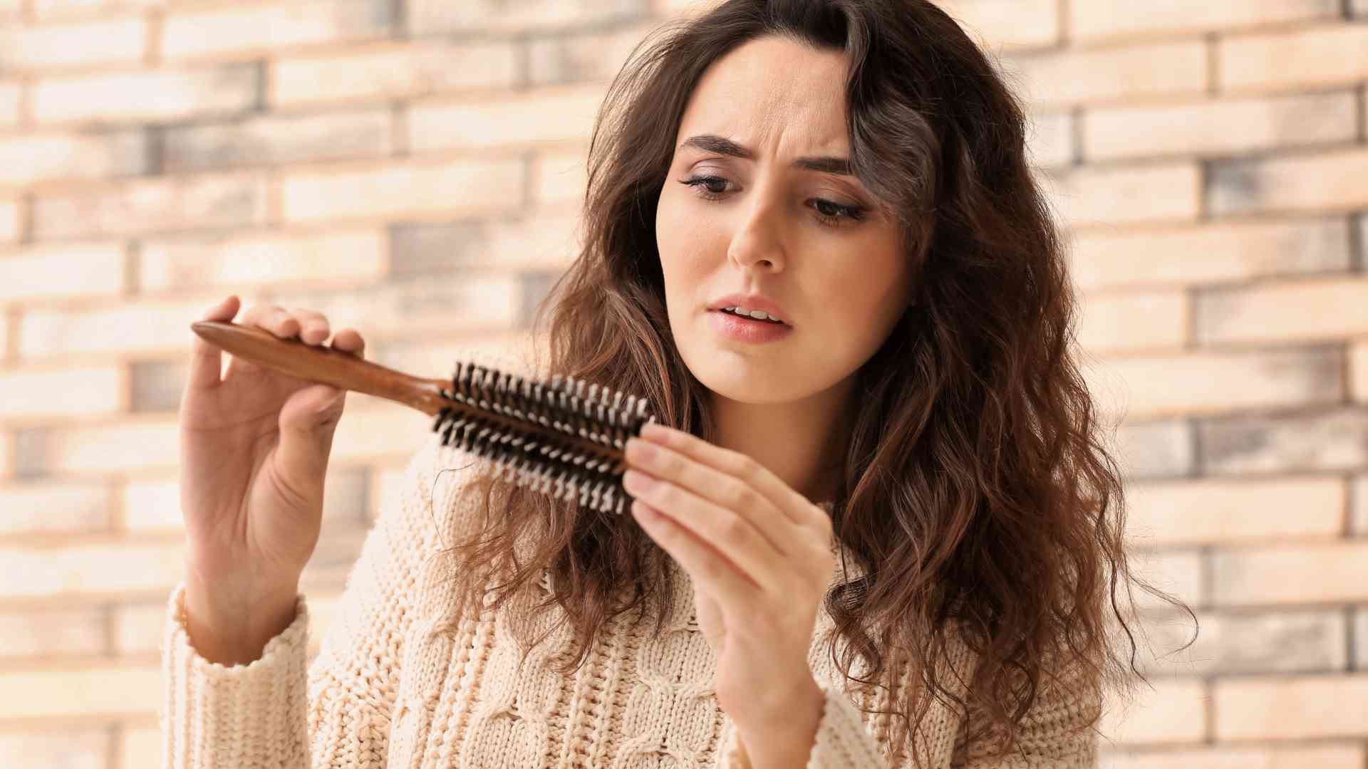 What role does gut health play in hair loss prevention, and how can it be improved