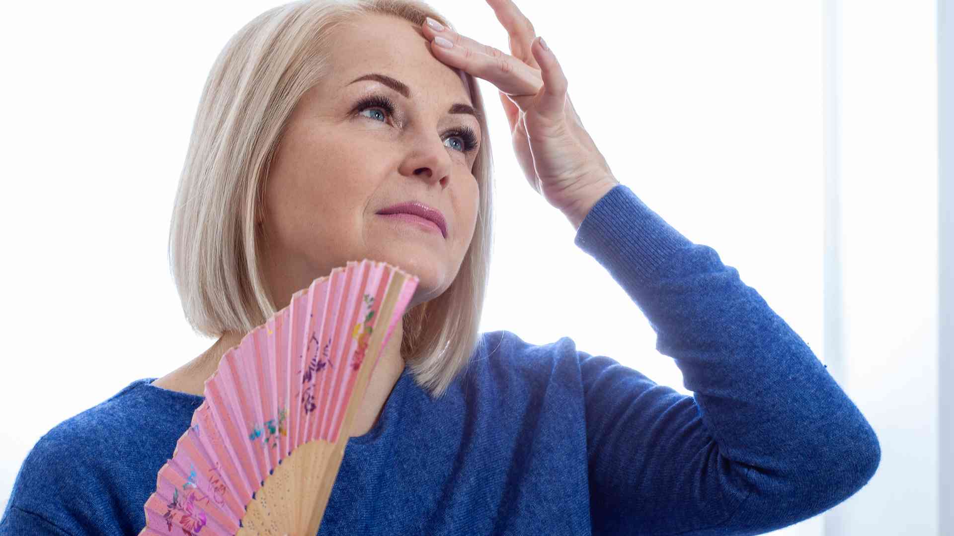 How does menopause impact hair loss in women